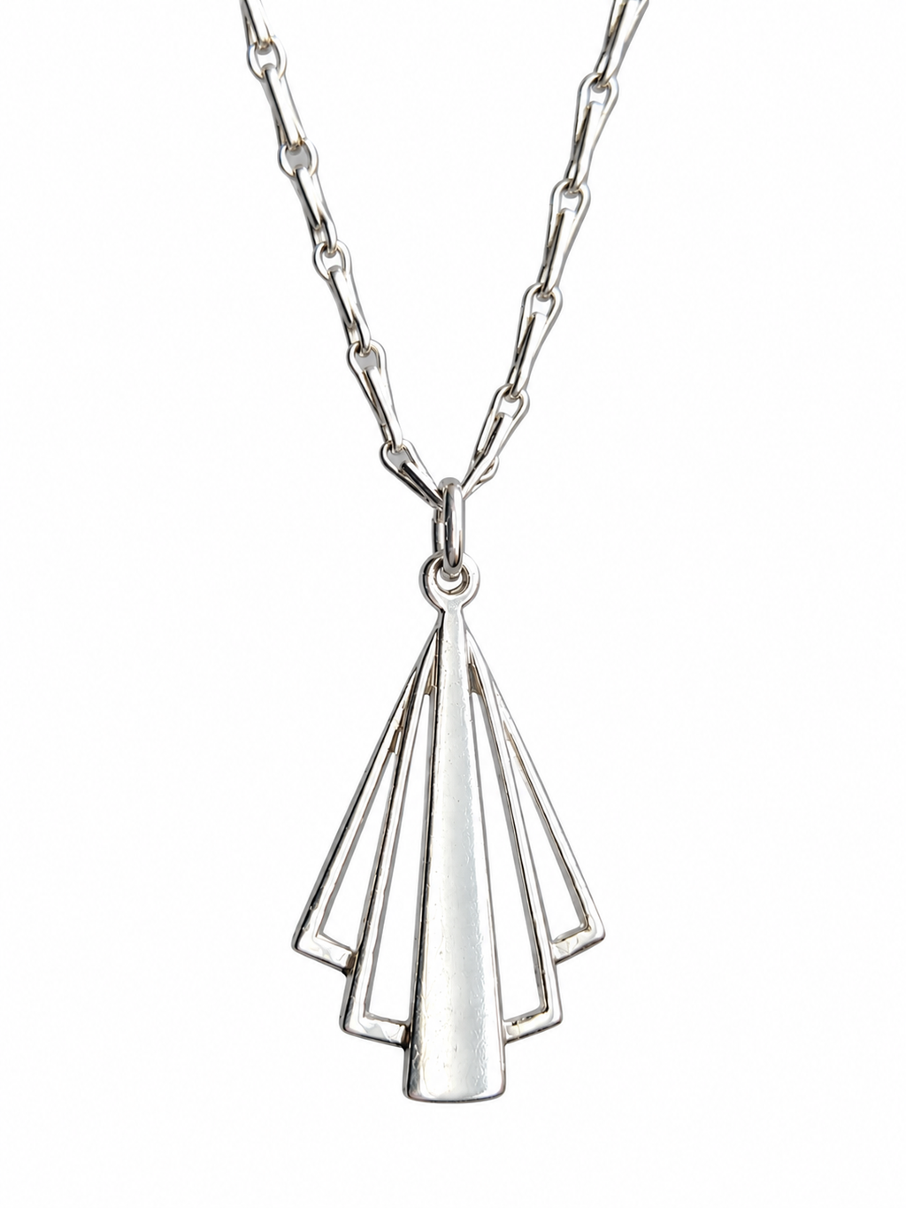 A silver pendant necklace featuring a geometric, fan-like openwork design on a delicate link chain, shown against a plain white background.
