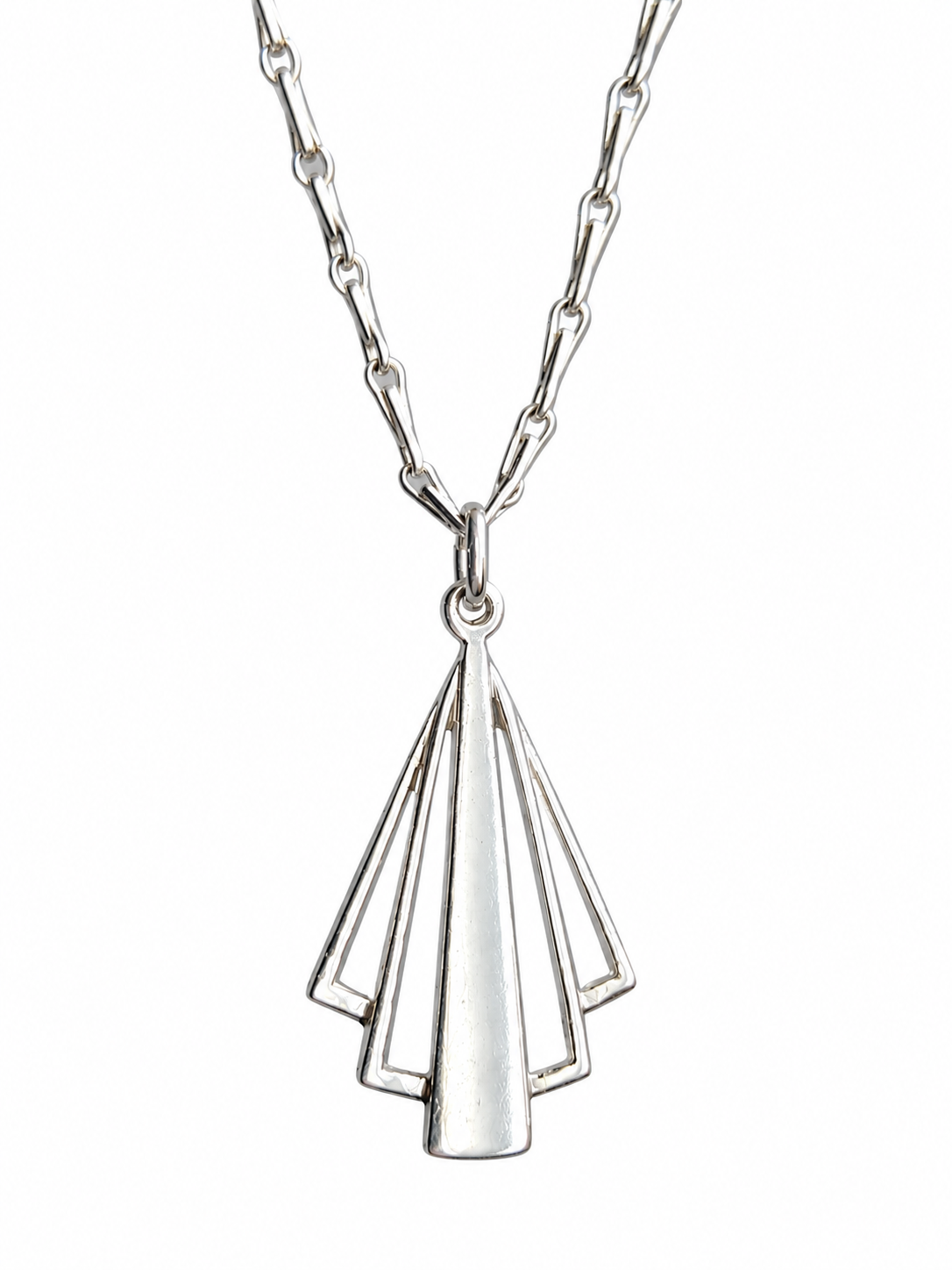 A silver pendant necklace featuring a geometric, fan-like openwork design on a delicate link chain, shown against a plain white background.